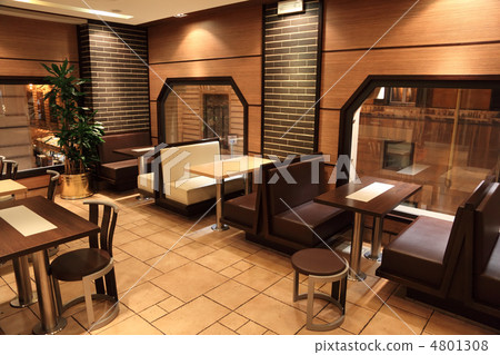 tables, chairs and windows in small restaurant in Rome, Italy 4801308