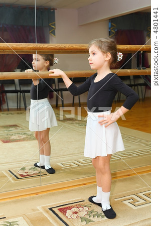 little girl wear pointe in ballet class near frame and large mir 4801441