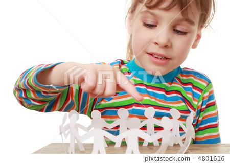 beautiful little girl in striped shirt play with garland of pape 4801616
