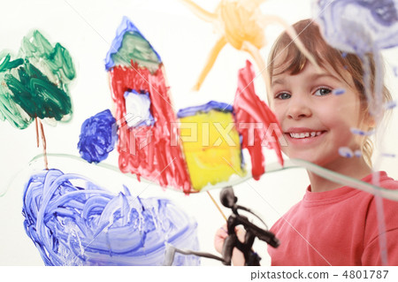 beautiful little girl in red t-shirt paints on glass and smiles, beautiful little girl in red t-shirt paints on glass and smiles, 4801787