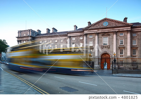 Trinity College at day in Dublin, Ireland. Bus quickly rides on 4801825
