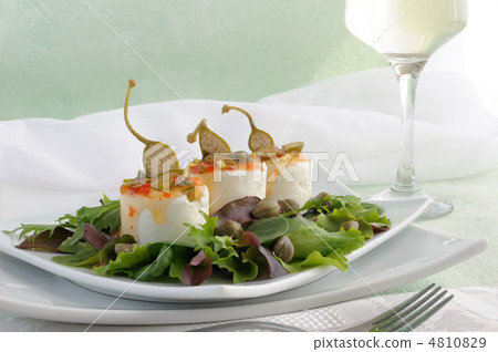 Cheese and capers sweet and sour sauce and pistachios 4810829