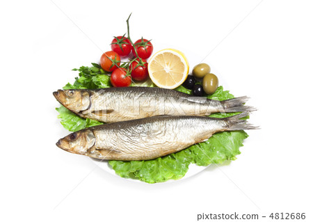 Smoked sprat-appetizing snack with tomato and lemon Smoked sprat-appetizing snack with tomato and lemon 4812686