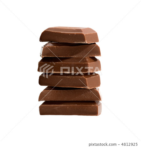 Chocolate pieces on white Chocolate pieces on white 4812925