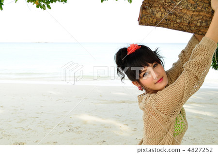 A young woman relaxing at Koh Samed Beach 4827252