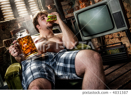 fat man eating hamburger fat man eating hamburger 4831387