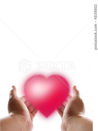 Hand enveloping heart 4839802