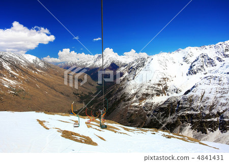 Wonderful view of the cableway in the mountains. 4841431