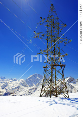Power line high in the mountains. Power line high in the mountains. 4841462