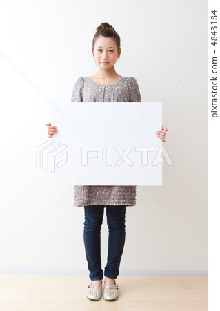 A woman with a white board 4843184