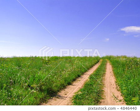 aging rural road on green field aging rural road on green field 4846440