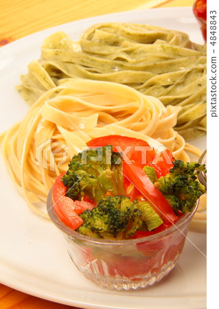 two italian tagliatelles and tomato with broccoli condiment two italian tagliatelles and tomato with broccoli condiment 4848843