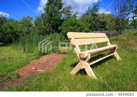 wooden bench in summer park wooden bench in summer park 4849083