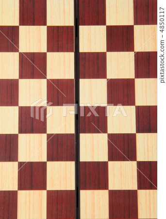 An old wooden chess board An old wooden chess board 4850117