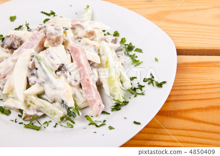 salad with meat on plate 4850409