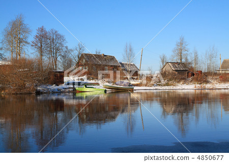 boats near villages on coast river boats near villages on coast river 4850677