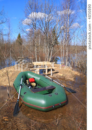 green rubber boat near coast 4850890