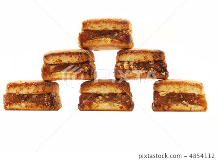 Pyramid of biscuits on a white background Pyramid of biscuits on a white background 4854112