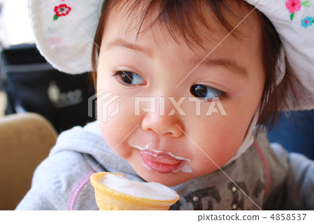 Child's face up eating ice cream 4858537