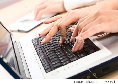 Human hands pressing keys Human hands pressing keys 4863301