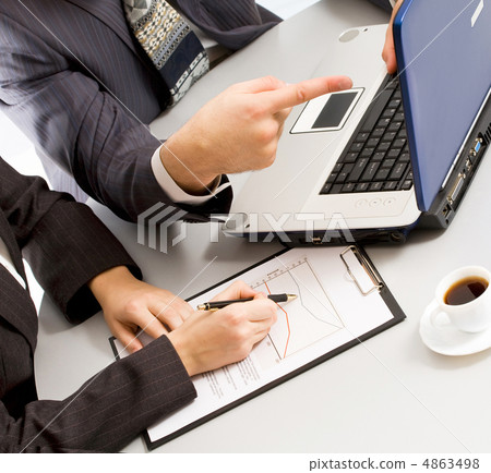 Working on laptop Working on laptop 4863498