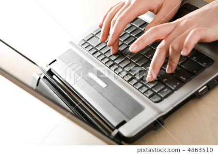 Working on the laptop Working on the laptop 4863510