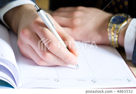 Hand holding a ballpoint pen Hand holding a ballpoint pen 4863552