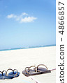 Sandy beach and beach sandals 4866857