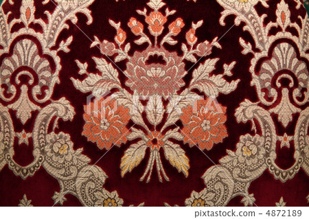 Crimson fabrics with golden pattern 4872189