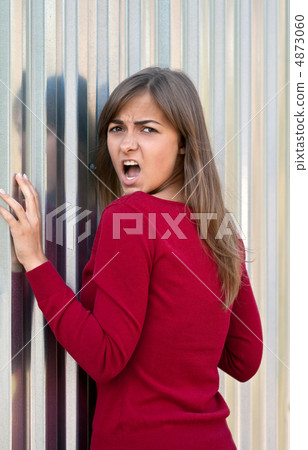 Beautiful girl in a purple dress Beautiful girl in a purple dress 4873060