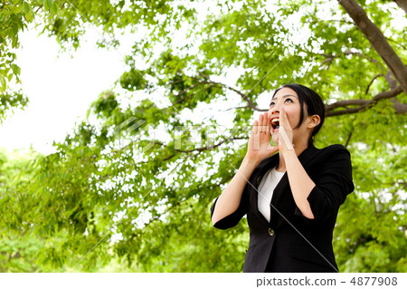 Business woman shouting at the park Business woman shouting at the park 4877908
