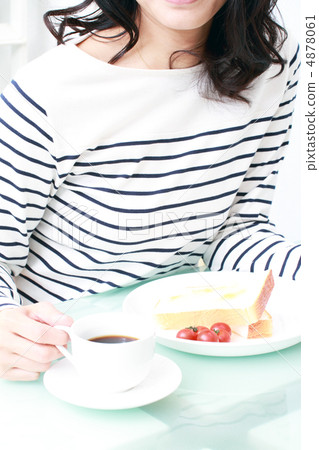 A young lady who takes breakfast A young lady who takes breakfast 4878061