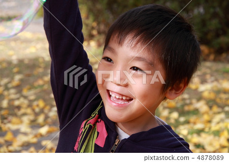 Kindergarten child playing soap bubble Kindergarten child playing soap bubble 4878089