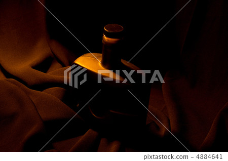 bottle on a black background bottle on a black background 4884641