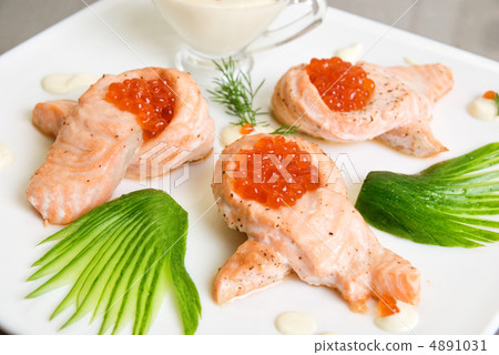 Fried salmon filet with red caviar Fried salmon filet with red caviar 4891031