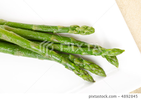Fresh asparagus on white Fresh asparagus on white 4892845