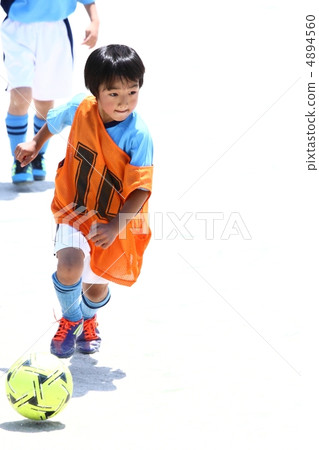 Soccer boy who dribbles with number 10 4894560