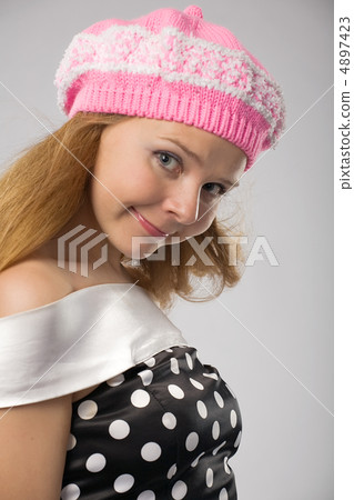 Beautiful girl with diffident smile Beautiful girl with diffident smile 4897423