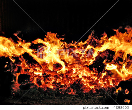 fire in stove fire in stove 4898603