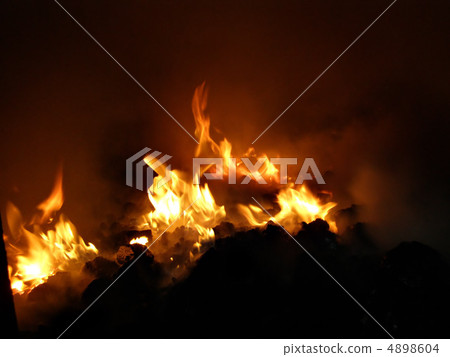 fire in stove fire in stove 4898604