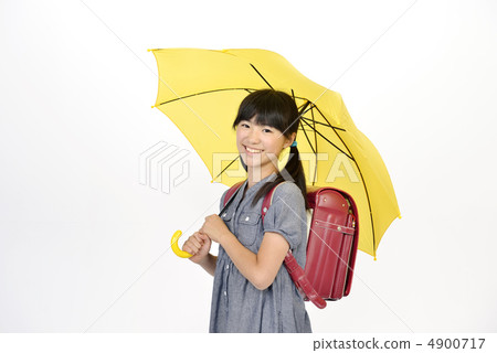 Elementary school girls popping umbrellas Elementary school girls popping umbrellas 4900717