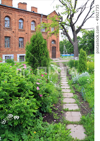lane in park near old-time building lane in park near old-time building 4902735