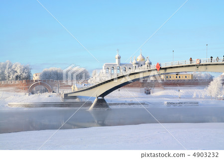 narrow bridge through ice river 4903232
