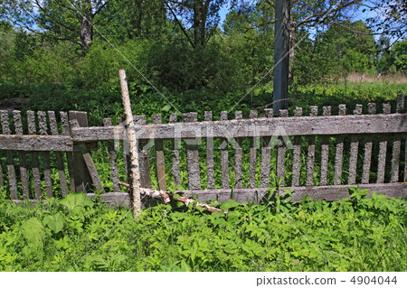 old fence in green herb old fence in green herb 4904044