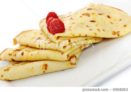 Crepe on a plate with a raspberry 4908063