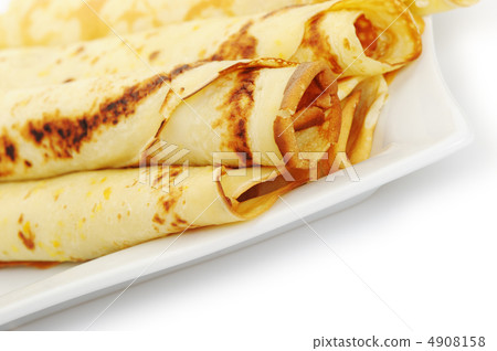 Crepe roll up a tubule on a plate Crepe roll up a tubule on a plate 4908158