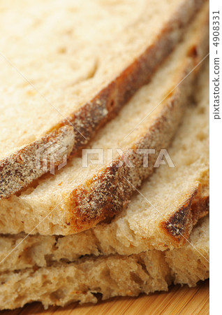 The cut bread on a chopping board The cut bread on a chopping board 4908331