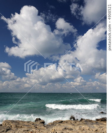 Splash of waves about coastal stones Splash of waves about coastal stones 4908521