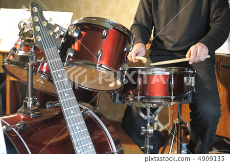The drummer in action The drummer in action 4909135