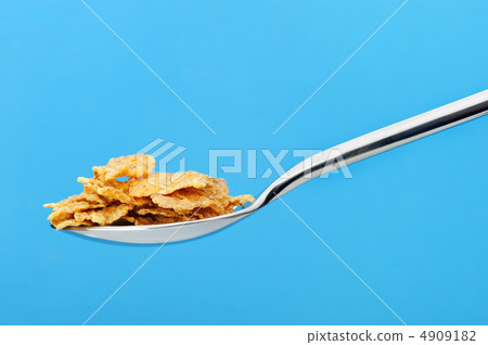 Сornflakes. A dry breakfast in a spoon. Сornflakes. A dry breakfast in a spoon. 4909182